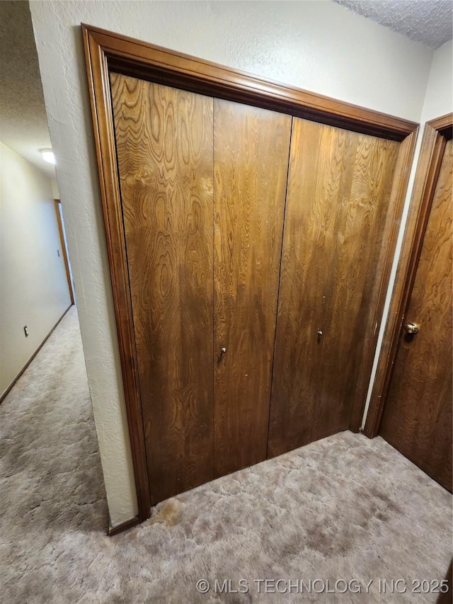 2230 Robin Ln, Muskogee, OK 74403 - detailed view of carpet flooring and a textured ceiling