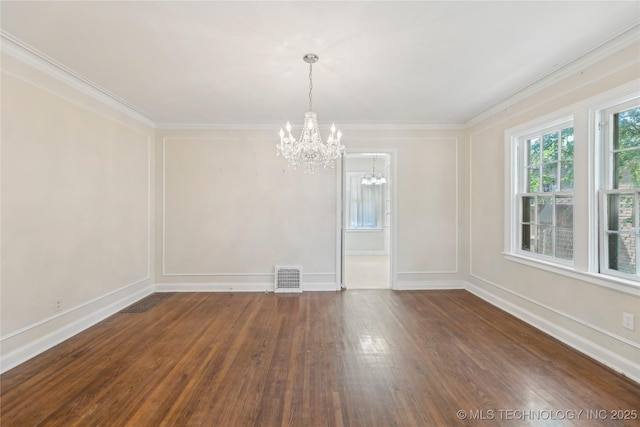 1648 S Evanston Ave, Tulsa, OK 74104 - spare room with a chandelier, wood finished floors, ornamental molding, and a decorative wall