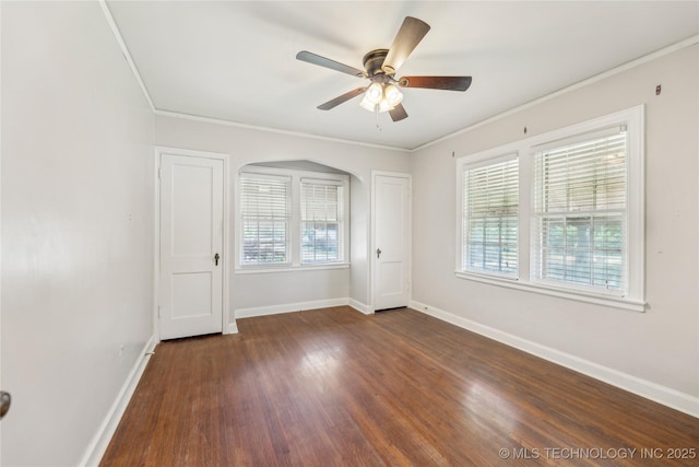 1648 S Evanston Ave, Tulsa, OK 74104 - unfurnished room featuring ornamental molding, plenty of natural light, baseboards, and dark wood finished floors