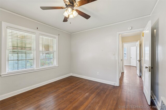 1648 S Evanston Ave, Tulsa, OK 74104 - spare room featuring dark wood-style floors, baseboards, ornamental molding, a ceiling fan, and a smoke detector