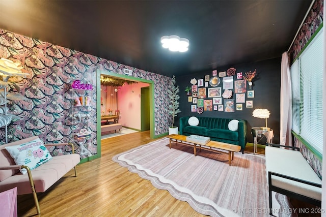 1610 S Ash Ave, Broken Arrow, OK 74012 - sitting room with wood finished floors and wallpapered walls