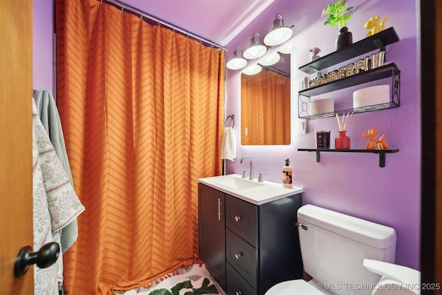 1610 S Ash Ave, Broken Arrow, OK 74012 - bathroom featuring toilet, vanity, and a shower with curtain