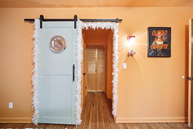 1610 S Ash Ave, Broken Arrow, OK 74012 - hall with wood finished floors and baseboards
