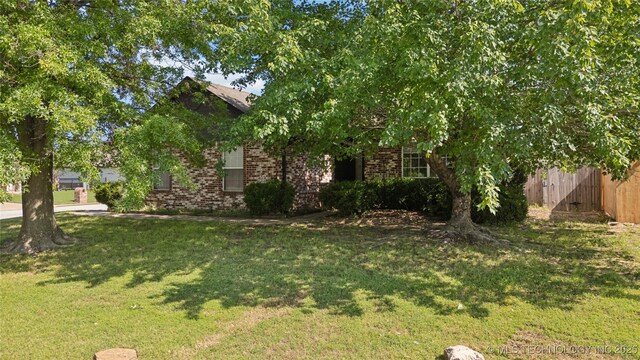 10901 E 95th St N, Owasso, OK 74055 - obstructed view of property featuring brick siding