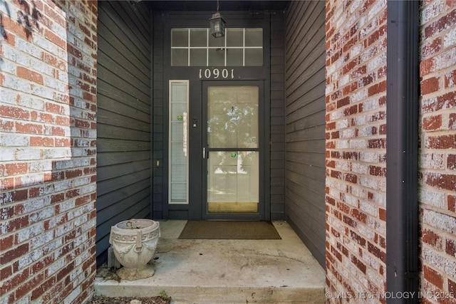 10901 E 95th St N, Owasso, OK 74055 - property entrance featuring brick siding