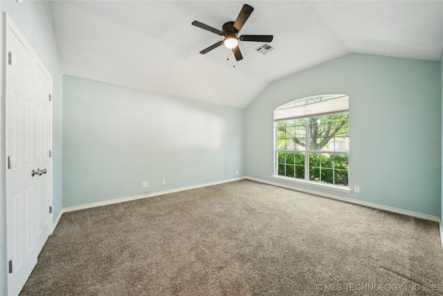 10901 E 95th St N, Owasso, OK 74055 - carpeted spare room with lofted ceiling, ceiling fan, and baseboards