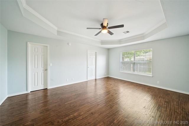10901 E 95th St N, Owasso, OK 74055 - unfurnished room featuring a raised ceiling, a ceiling fan, ornamental molding, wood finished floors, and baseboards