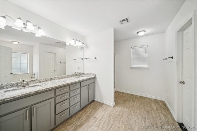10901 E 95th St N, Owasso, OK 74055 - full bath featuring double vanity, baseboards, and a shower
