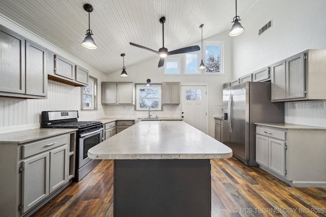 2110 S 289th E Ave, Broken Arrow, OK 74014 - kitchen featuring stainless steel appliances, gray cabinets, a sink, wooden ceiling, and high vaulted ceiling
