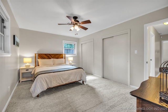 4023 E 36th St S, Tulsa, OK 74135 - carpeted bedroom featuring multiple closets and ceiling fan