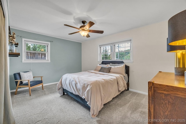 4023 E 36th St S, Tulsa, OK 74135 - carpeted bedroom with multiple windows and a ceiling fan
