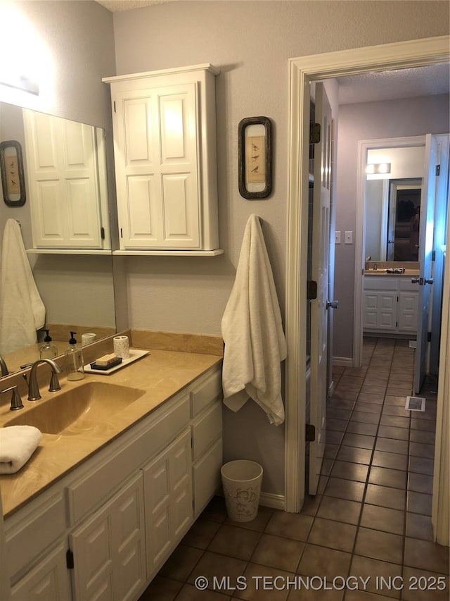 18820 Ridge Rd, Catoosa, OK 74015 - bathroom with tile patterned flooring and vanity
