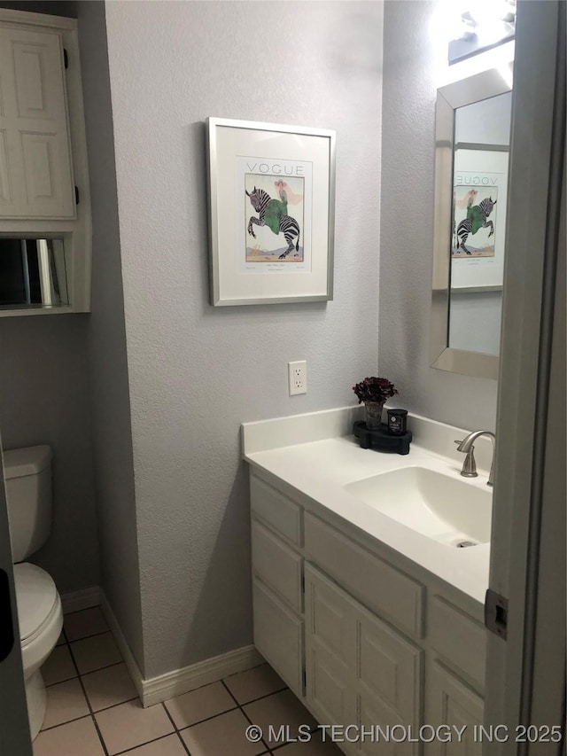 18820 Ridge Rd, Catoosa, OK 74015 - bathroom featuring toilet, vanity, and tile patterned flooring