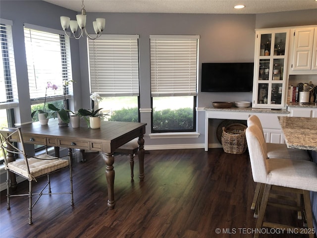 18820 Ridge Rd, Catoosa, OK 74015 - dining space with a chandelier, healthy amount of natural light, dark wood-type flooring, and recessed lighting