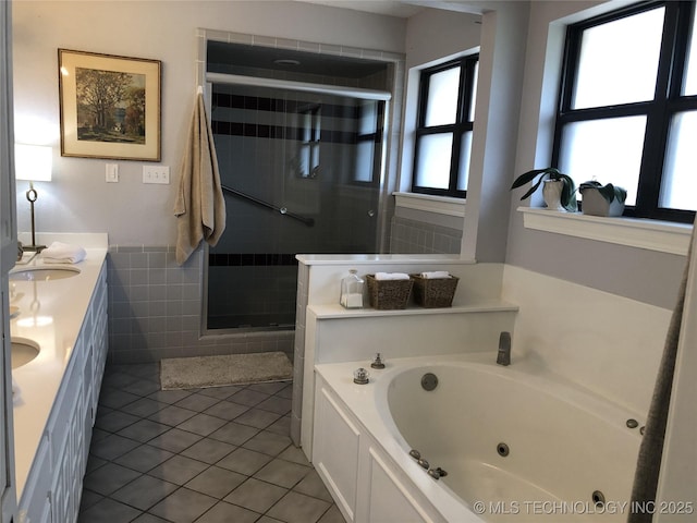 18820 Ridge Rd, Catoosa, OK 74015 - bathroom featuring tile patterned floors, a stall shower, a whirlpool tub, tile walls, and double vanity
