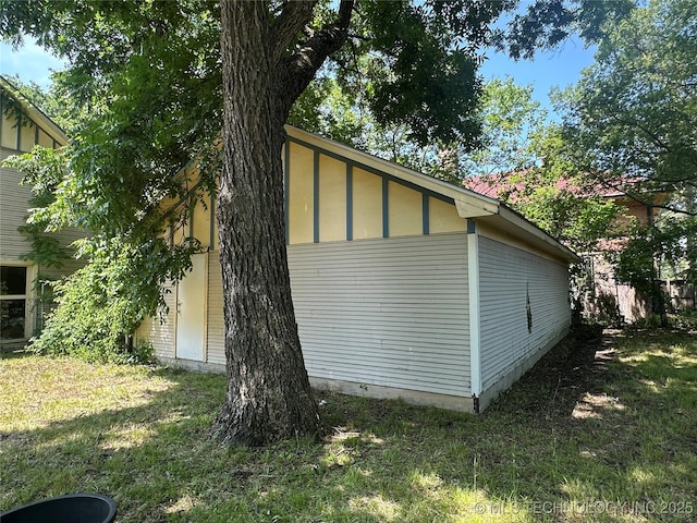 502 S Okmulgee Ave, Okmulgee, OK 74447 - view of property exterior featuring a lawn