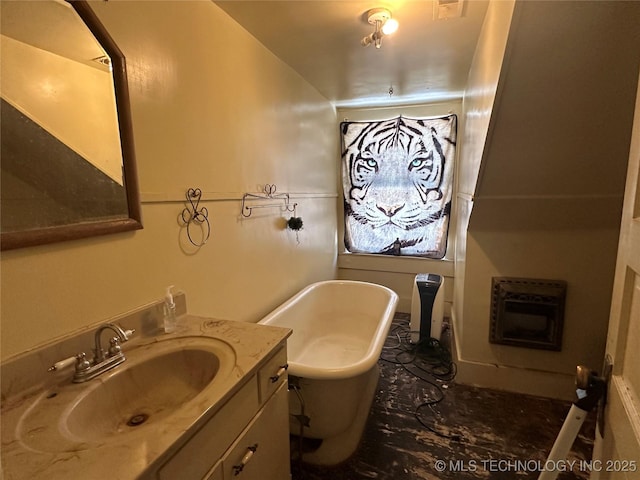 502 S Okmulgee Ave, Okmulgee, OK 74447 - full bath with a freestanding bath, vanity, and heating unit