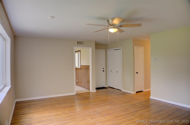 5764 E 30th Pl, Tulsa, OK 74114 - unfurnished room featuring ceiling fan, light wood-type flooring, and baseboards