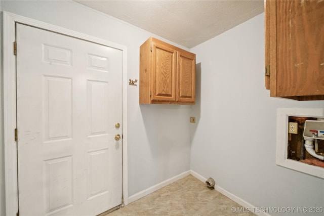 1703 Elm St, Owasso, OK 74055 - laundry area featuring cabinet space, hookup for a washing machine, baseboards, and light carpet