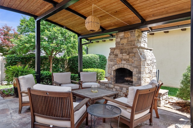 1336 E 35th Pl, Tulsa, OK 74105 - view of patio featuring an outdoor living space with a fireplace