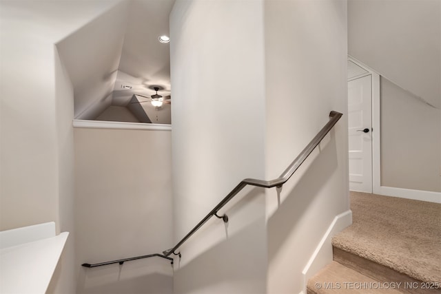 1336 E 35th Pl, Tulsa, OK 74105 - staircase featuring vaulted ceiling, carpet flooring, a ceiling fan, and baseboards