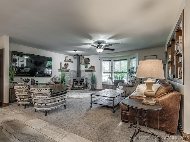 32188 E 738th Rd, Wagoner, OK 74467 - living area with a wood stove and a ceiling fan