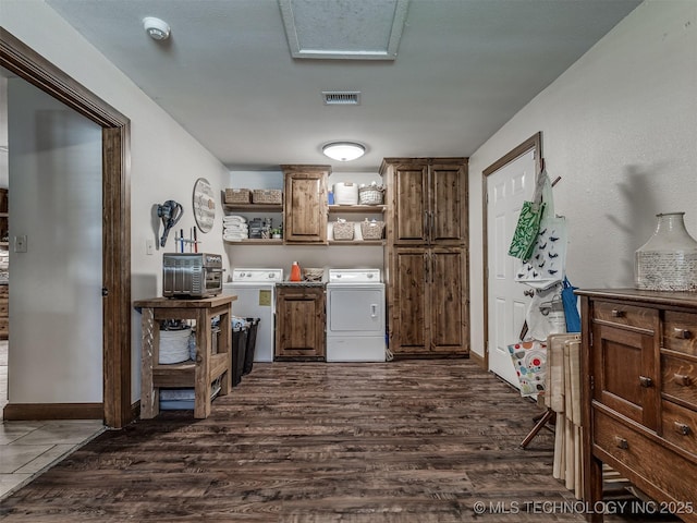 32188 E 738th Rd, Wagoner, OK 74467 - kitchen with washing machine and dryer, open shelves, dark wood finished floors, and brown cabinetry
