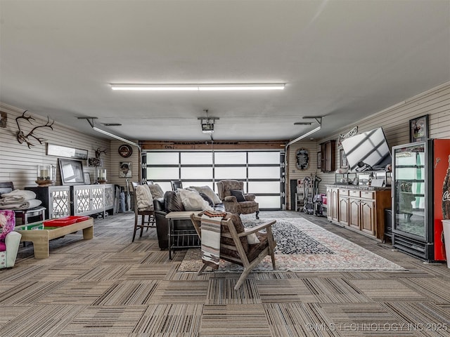 32188 E 738th Rd, Wagoner, OK 74467 - garage with wood walls and a garage door opener