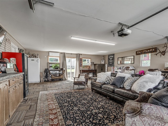 32188 E 738th Rd, Wagoner, OK 74467 - living room featuring wood walls