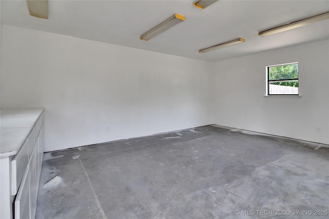 245 E 148th St S, Glenpool, OK 74033 - spare room featuring unfinished concrete floors