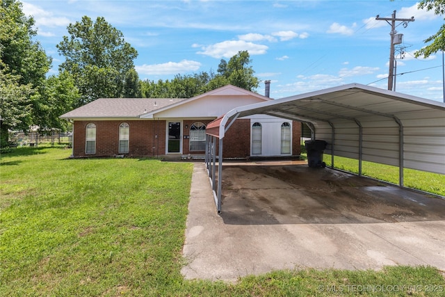 1408 11th NW, Ardmore, OK 73401 - ranch-style home featuring a detached carport, brick siding, concrete driveway, and a shingled roof