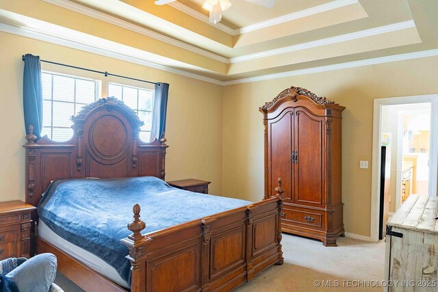 210 S Water St, Sapulpa, OK 74066 - bedroom featuring light carpet, a tray ceiling, and crown molding