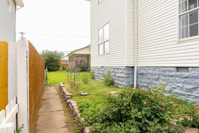 210 S Water St, Sapulpa, OK 74066 - view of property exterior featuring crawl space