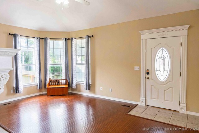 210 S Water St, Sapulpa, OK 74066 - foyer entrance featuring baseboards, light wood finished floors, and ceiling fan