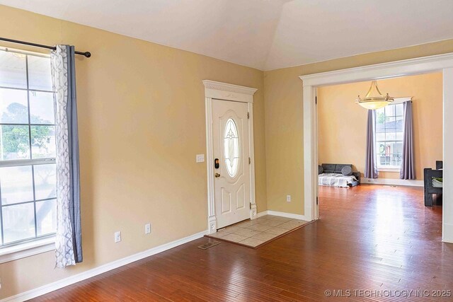 210 S Water St, Sapulpa, OK 74066 - entryway with healthy amount of natural light, wood-type flooring, and baseboards