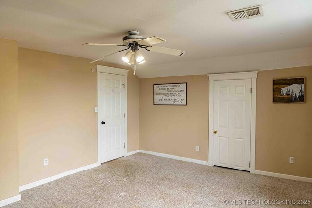 210 S Water St, Sapulpa, OK 74066 - empty room with ceiling fan, carpet flooring, and baseboards