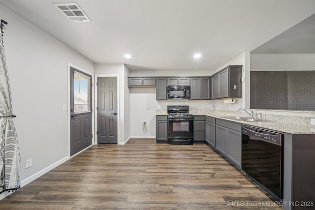 5976 E 147th St S, Bixby, OK 74008 - kitchen with black appliances, a sink, gray cabinetry, baseboards, and dark wood-style flooring