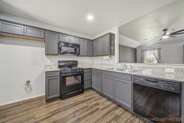 5976 E 147th St S, Bixby, OK 74008 - kitchen featuring black appliances, a sink, gray cabinetry, and wood finished floors