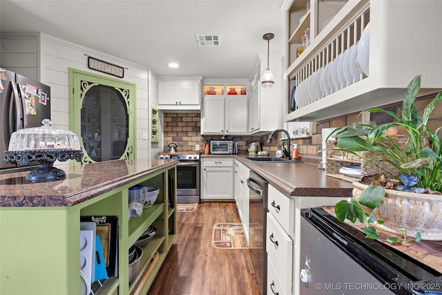 6472 Kings Rd, Ardmore, OK 73401 - kitchen featuring a sink, appliances with stainless steel finishes, open shelves, white cabinetry, and wood finished floors