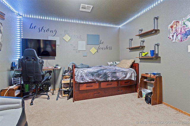 6472 Kings Rd, Ardmore, OK 73401 - carpeted bedroom featuring baseboards and a desk