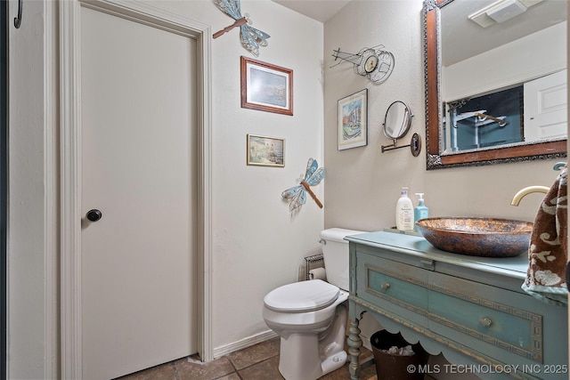 6472 Kings Rd, Ardmore, OK 73401 - bathroom featuring vanity, toilet, and tile patterned flooring