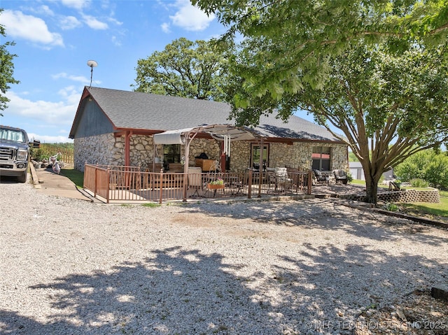 6472 Kings Rd, Ardmore, OK 73401 - view of front of home with stone siding and roof with shingles