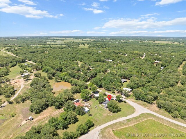 6472 Kings Rd, Ardmore, OK 73401 - drone / aerial view of a heavily wooded area