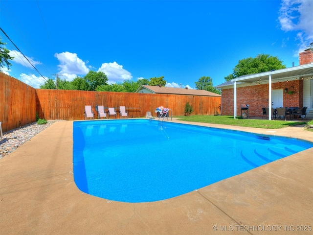 1518 E 58th St, Tulsa, OK 74105 - view of pool featuring a fenced backyard, a patio area, and grilling area