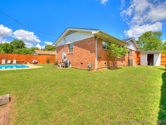 1518 E 58th St, Tulsa, OK 74105 - rear view of house with brick siding, crawl space, and central air condition unit
