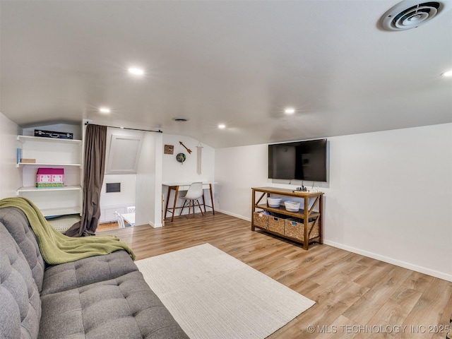 1518 E 58th St, Tulsa, OK 74105 - living area featuring wood finished floors, recessed lighting, baseboards, and lofted ceiling