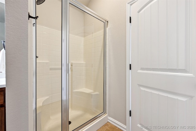 4701 S 179th E Ave, Tulsa, OK 74134 - bathroom featuring a stall shower and vanity