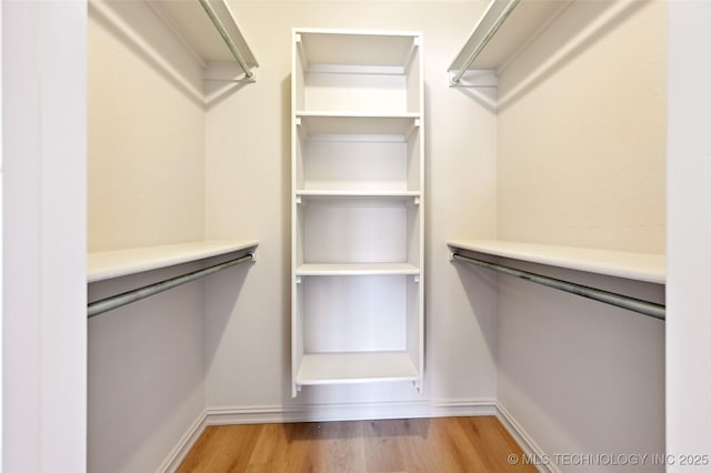 4701 S 179th E Ave, Tulsa, OK 74134 - walk in closet with light wood finished floors