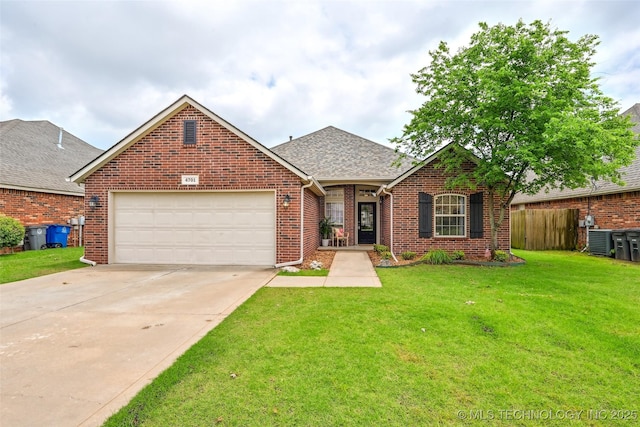 4701 S 179th E Ave, Tulsa, OK 74134 - traditional-style house with brick siding, an attached garage, driveway, roof with shingles, and central AC