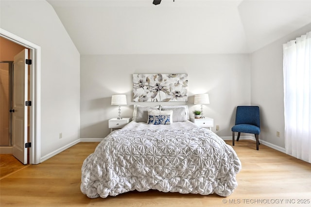 4701 S 179th E Ave, Tulsa, OK 74134 - bedroom with vaulted ceiling, wood finished floors, baseboards, and ceiling fan